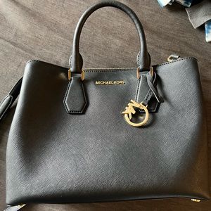 Michael Kors black tote in black with gold hardware new never used